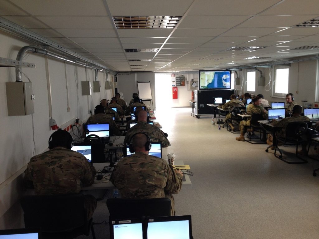 Soldiers use VBS to work on reporting procedures. Credit: US Army